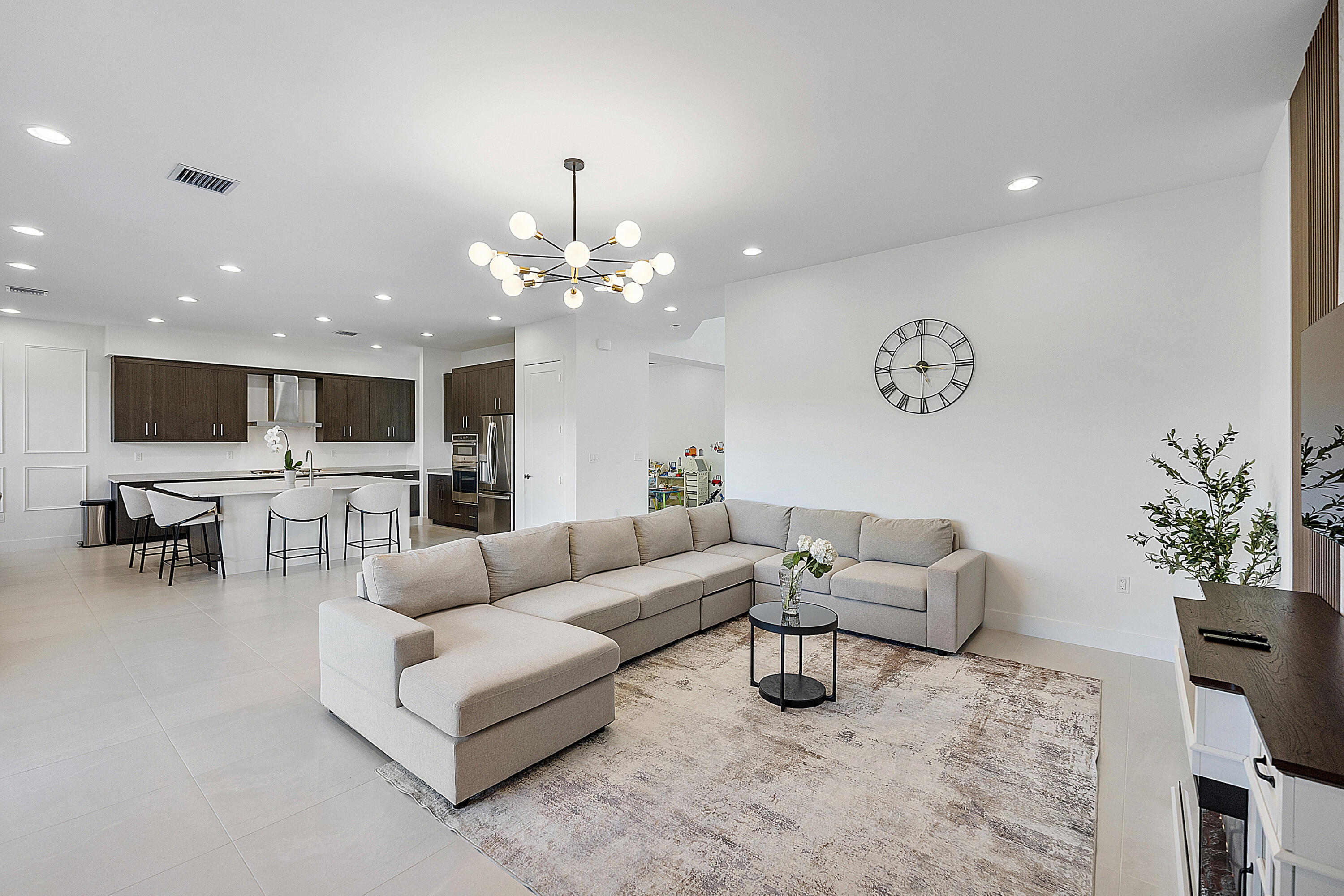 20296 Somerset Hls Drive Boca Raton, FL 33434 - Photo 15 of 67 a living room with furniture and view of kitchen