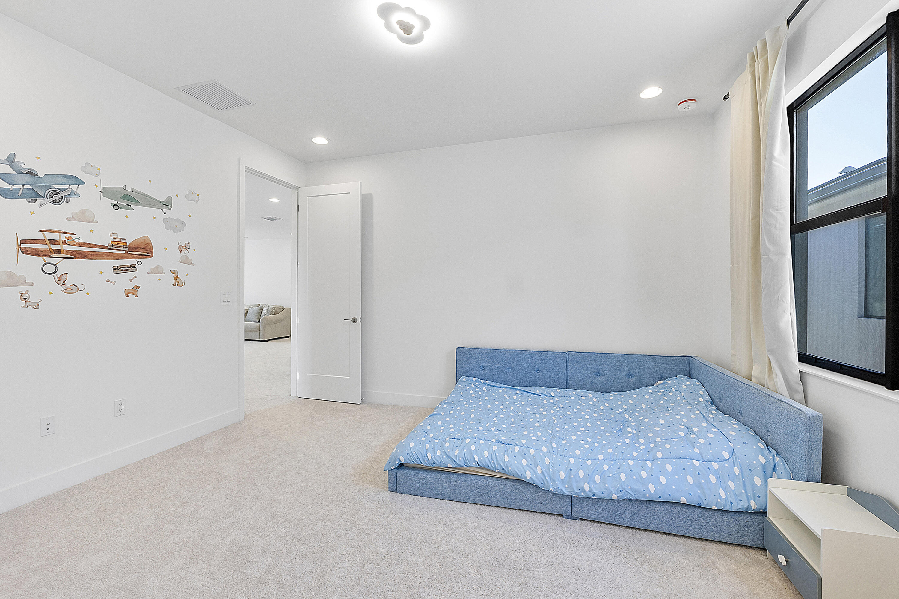 20296 Somerset Hls Drive Boca Raton, FL 33434 - Photo 33 of 67 a bedroom with a bed and painting on the wall