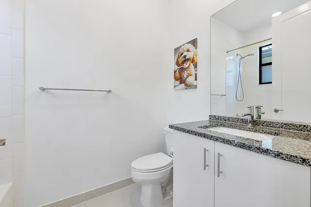 a utility room with cabinets