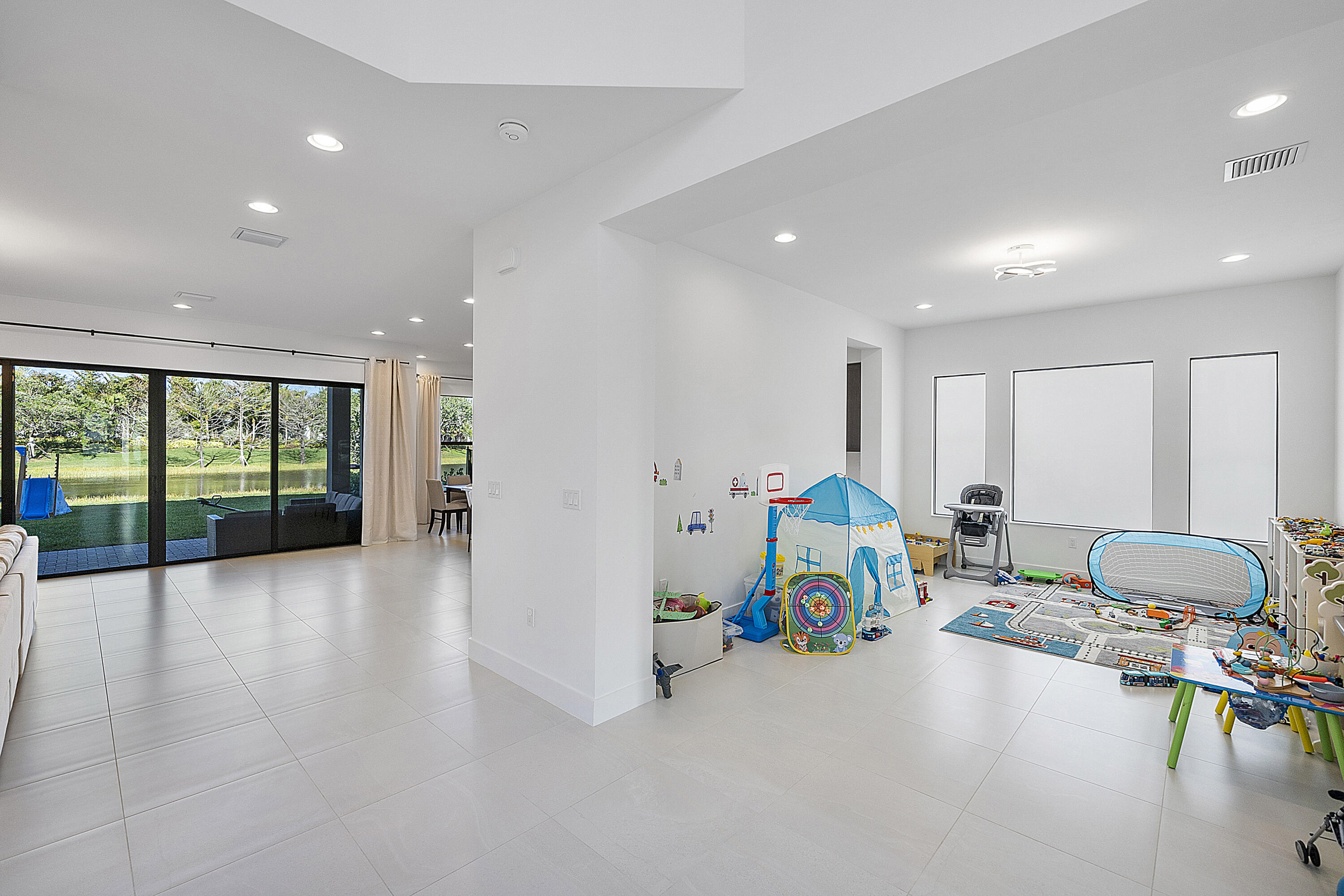 20296 Somerset Hls Drive Boca Raton, FL 33434 - Photo 10 of 67 a living room with furniture and a table