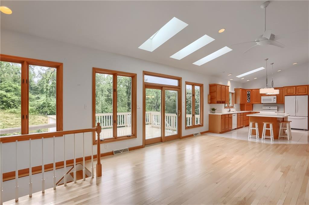 377 Magee Road Sewickley, PA 15143 - Photo 11 of 50 a view of an empty room with window and wooden floor