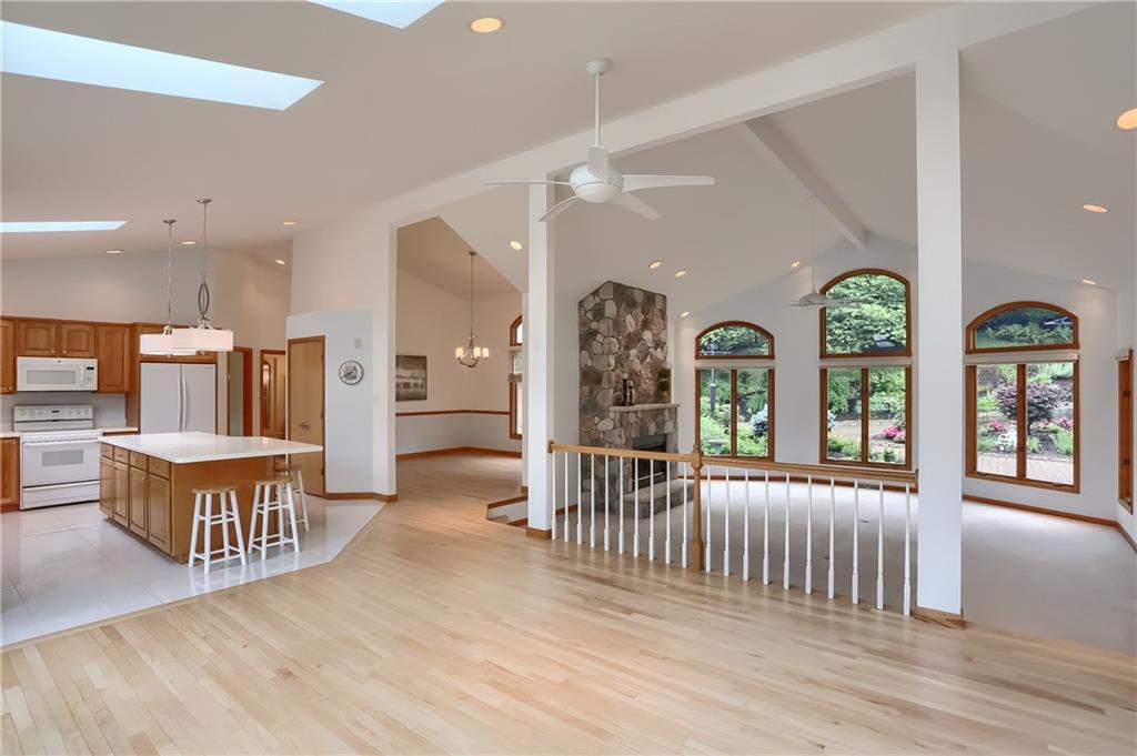 377 Magee Road Sewickley, PA 15143 - Photo 12 of 50 an empty room with wooden floor and windows
