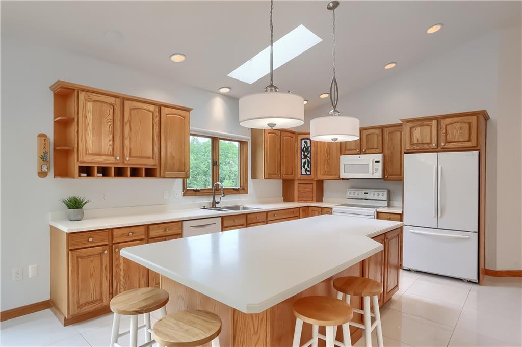 377 Magee Road Sewickley, PA 15143 - Photo 15 of 50 a large kitchen with a table and chairs
