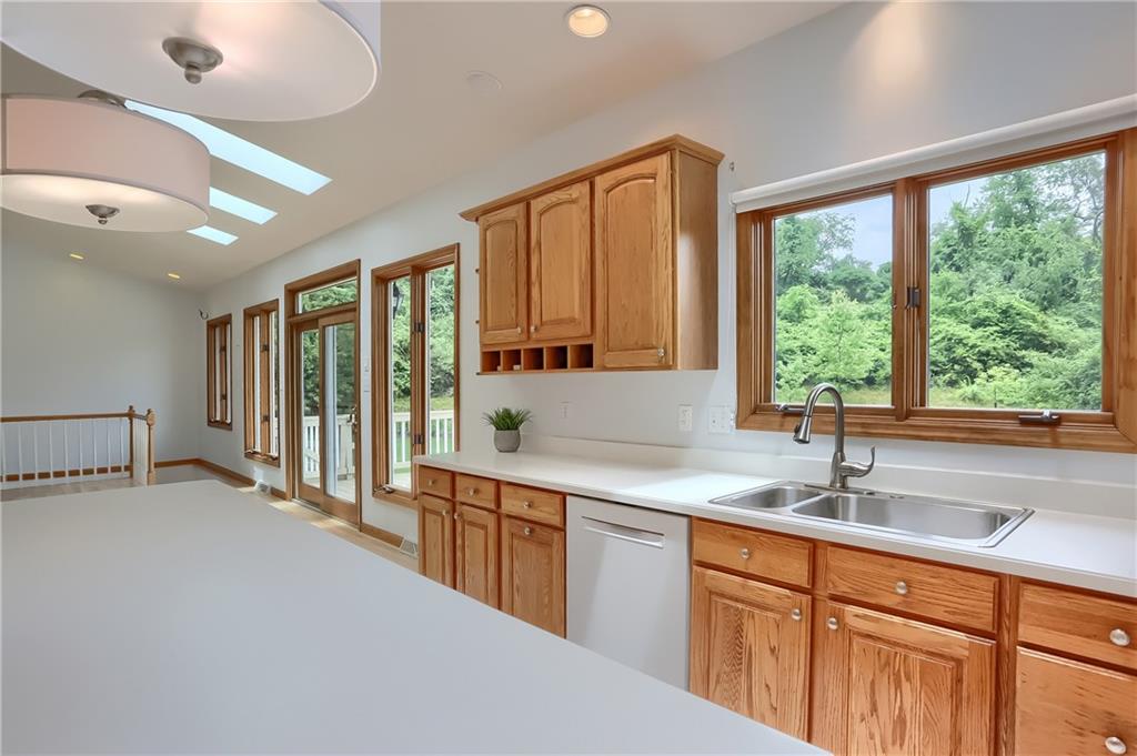 377 Magee Road Sewickley, PA 15143 - Photo 19 of 50 a kitchen with lots of counter top space and sink