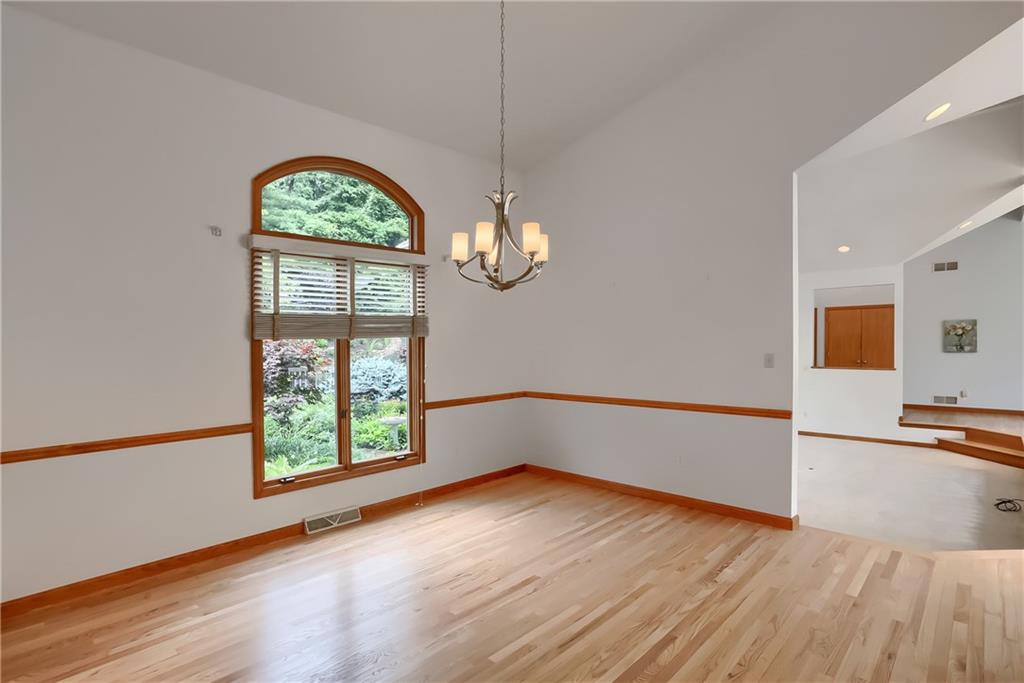 377 Magee Road Sewickley, PA 15143 - Photo 21 of 50 an empty room with wooden floor and windows