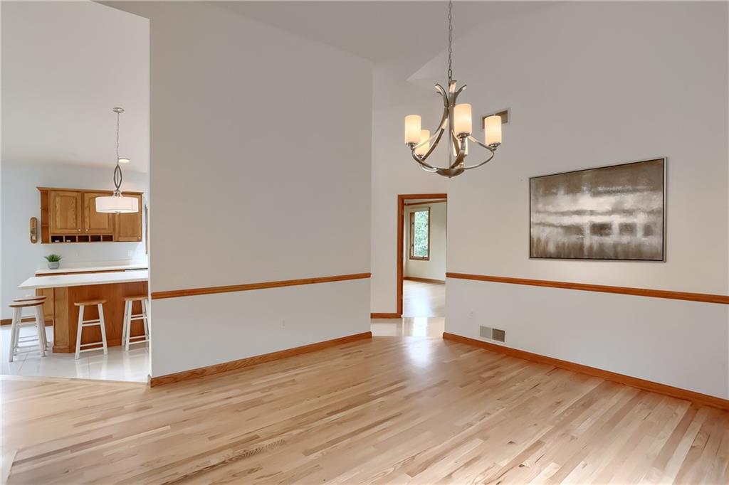 377 Magee Road Sewickley, PA 15143 - Photo 22 of 50 a view of an empty room with wooden floor and a window
