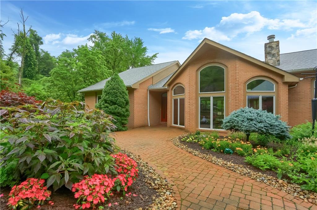 377 Magee Road Sewickley, PA 15143 - Photo 3 of 50 a front view of a house with a yard
