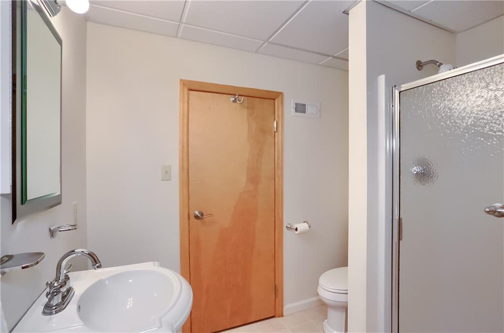377 Magee Road Sewickley, PA 15143 - Photo 33 of 50 a bathroom with a sink a toilet and shower