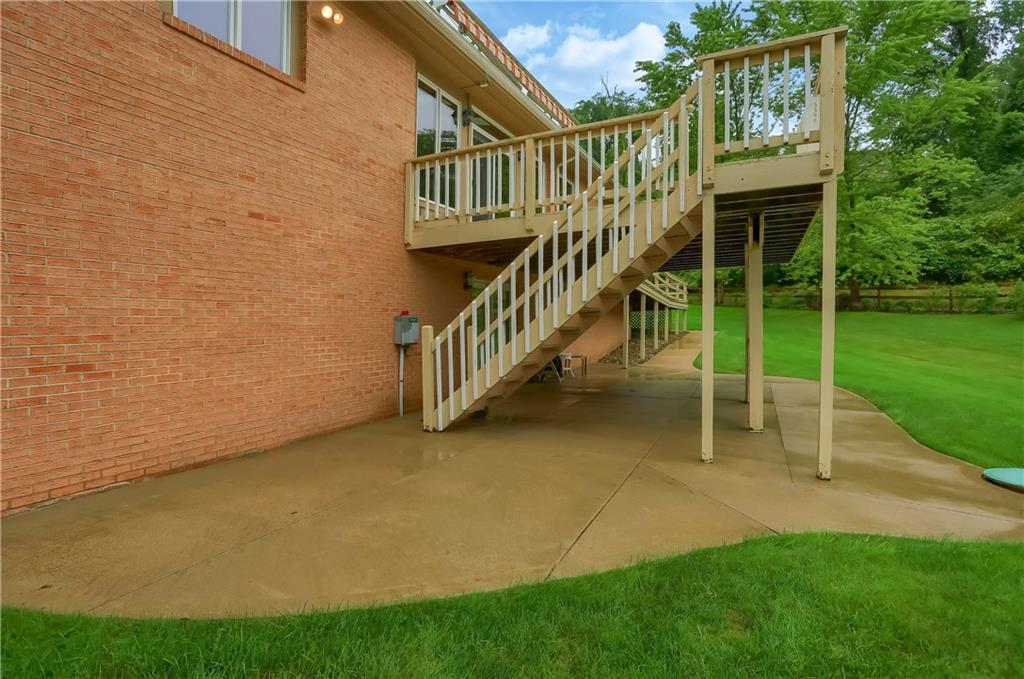 377 Magee Road Sewickley, PA 15143 - Photo 40 of 50 a view of a house with backyard and deck