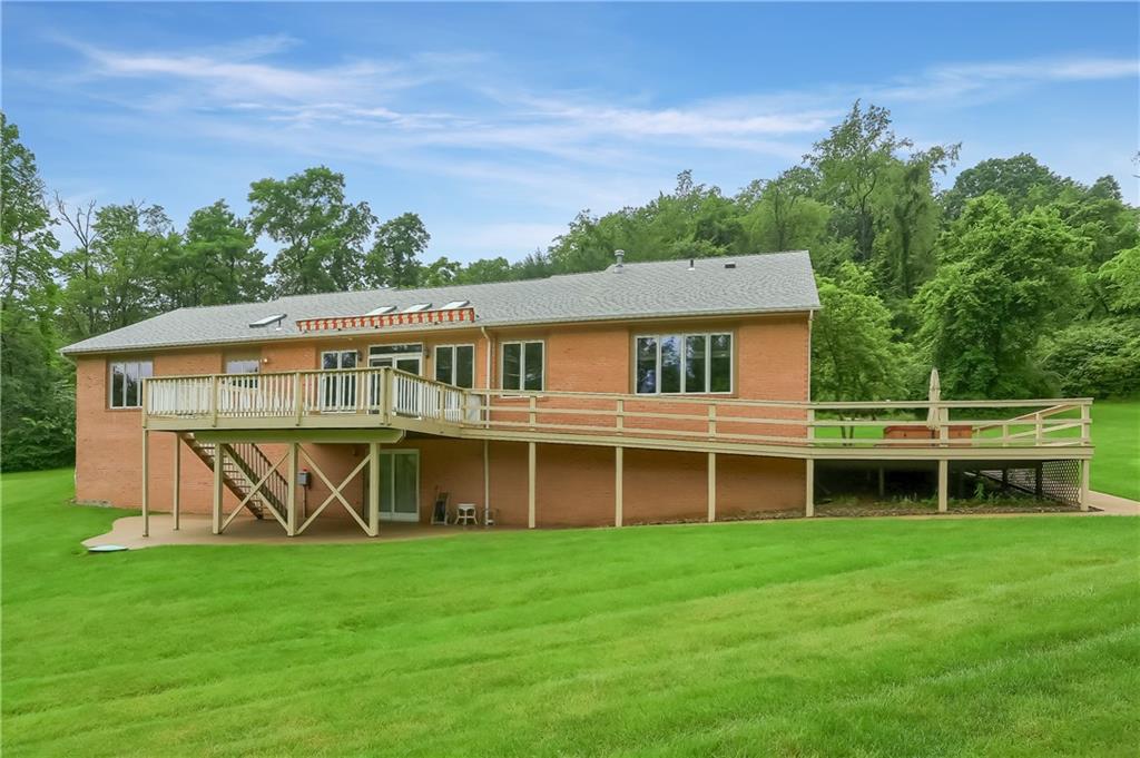 377 Magee Road Sewickley, PA 15143 - Photo 42 of 50 a front view of a house with a yard