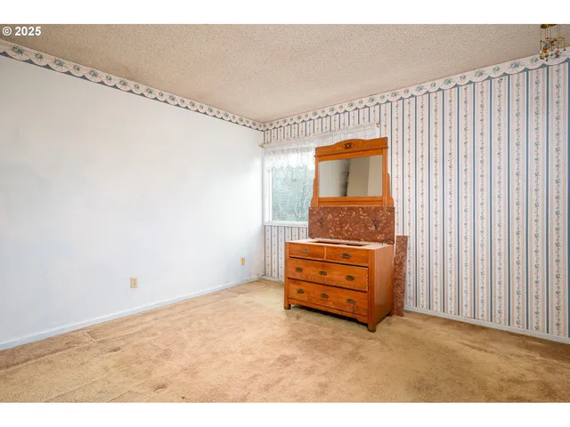 a room with a dresser