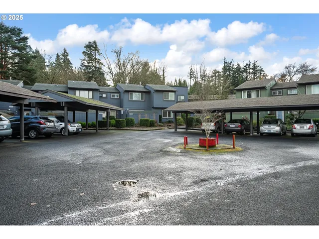 a view of street with parked cars