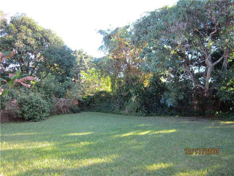 576 Northwest 147th Street Miami, FL 33168 - Photo 3 of 3 a view of a garden with a tree