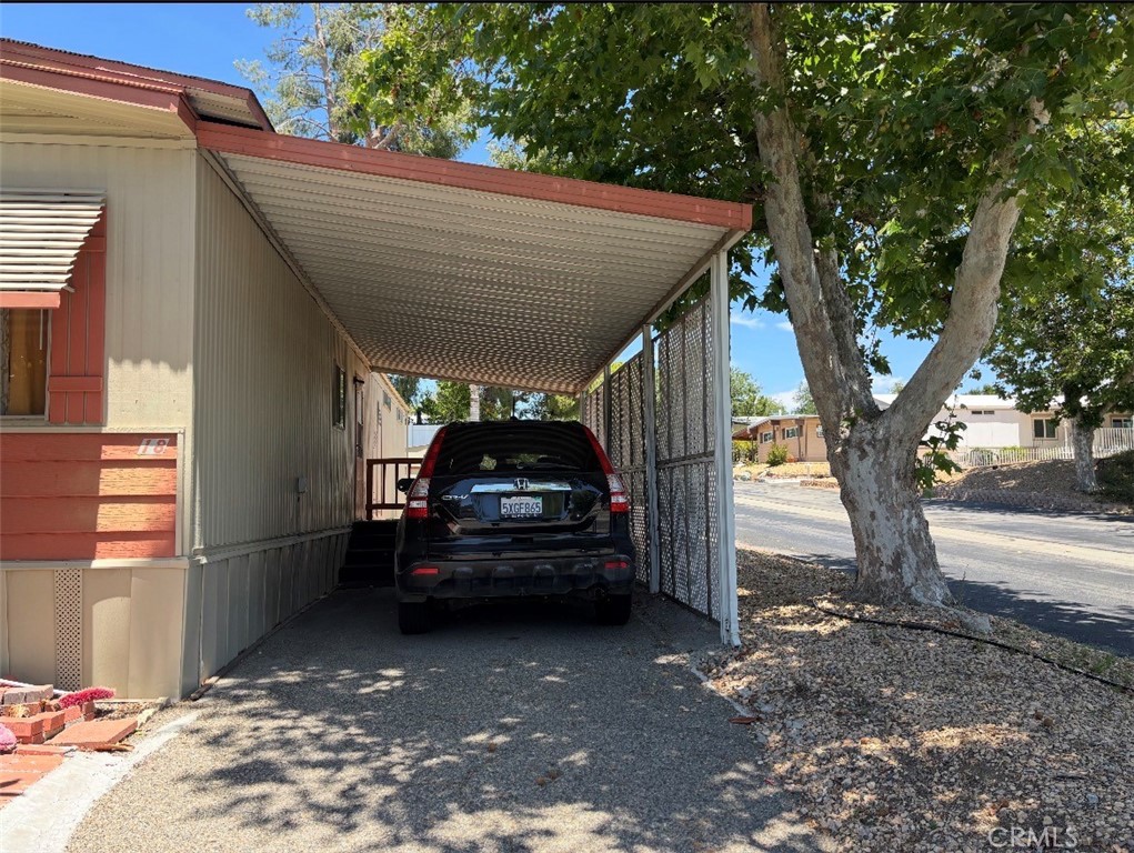 31130 South General Kearny Road, Unit 18 Temecula, CA 92591 - Photo 2 of 32 Garage port