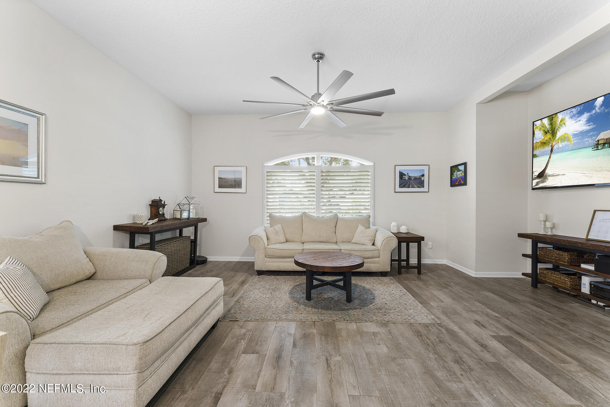 1145 Overdale Road St. Augustine, FL 32080 - Photo 26 of 85 a living room with furniture a window and a table