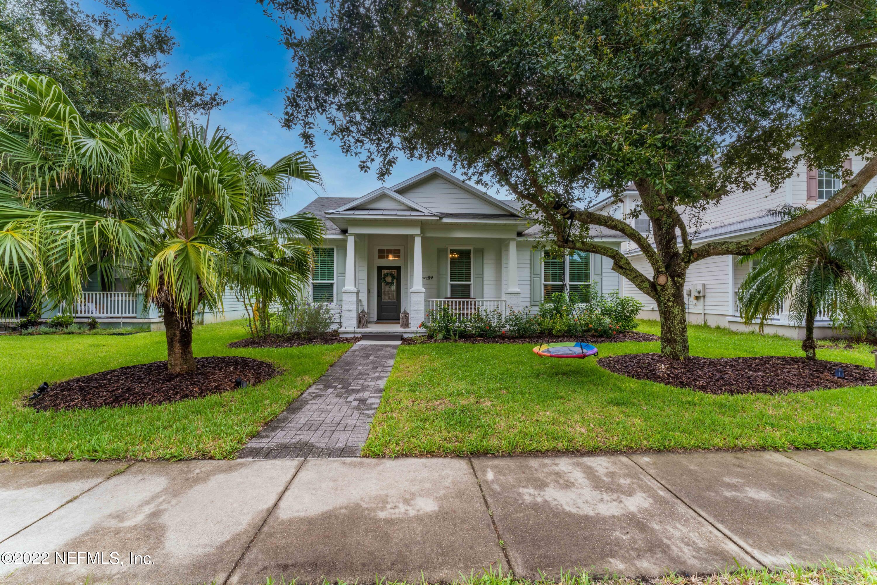 1145 Overdale Road St. Augustine, FL 32080 - Photo 3 of 85 a front view of a house with a garden