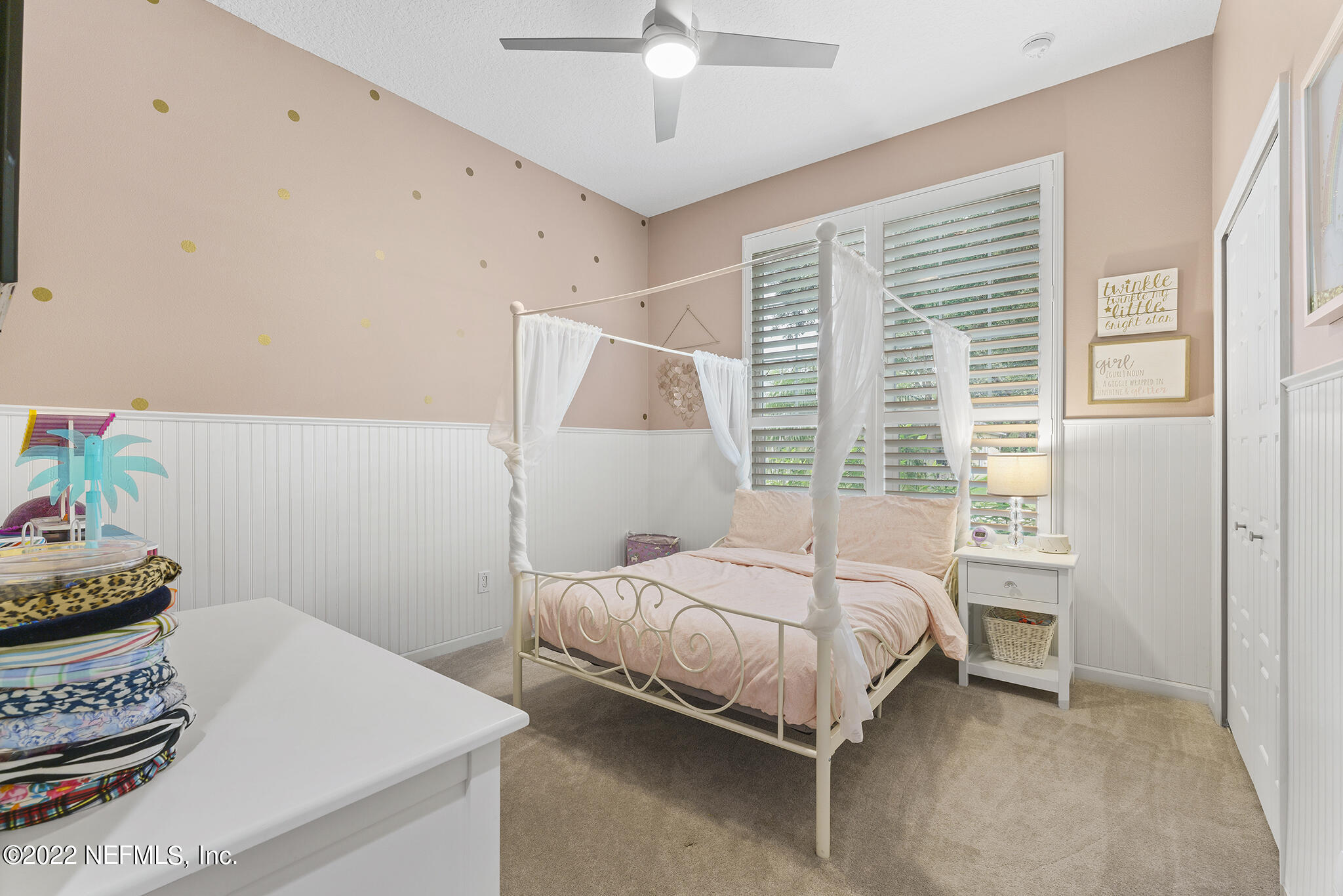 1145 Overdale Road St. Augustine, FL 32080 - Photo 38 of 85 a bedroom with a bed and a window