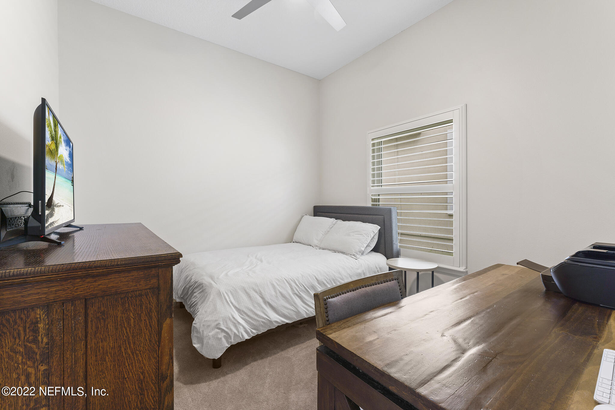 1145 Overdale Road St. Augustine, FL 32080 - Photo 41 of 85 a bedroom with a bed and a flat screen tv