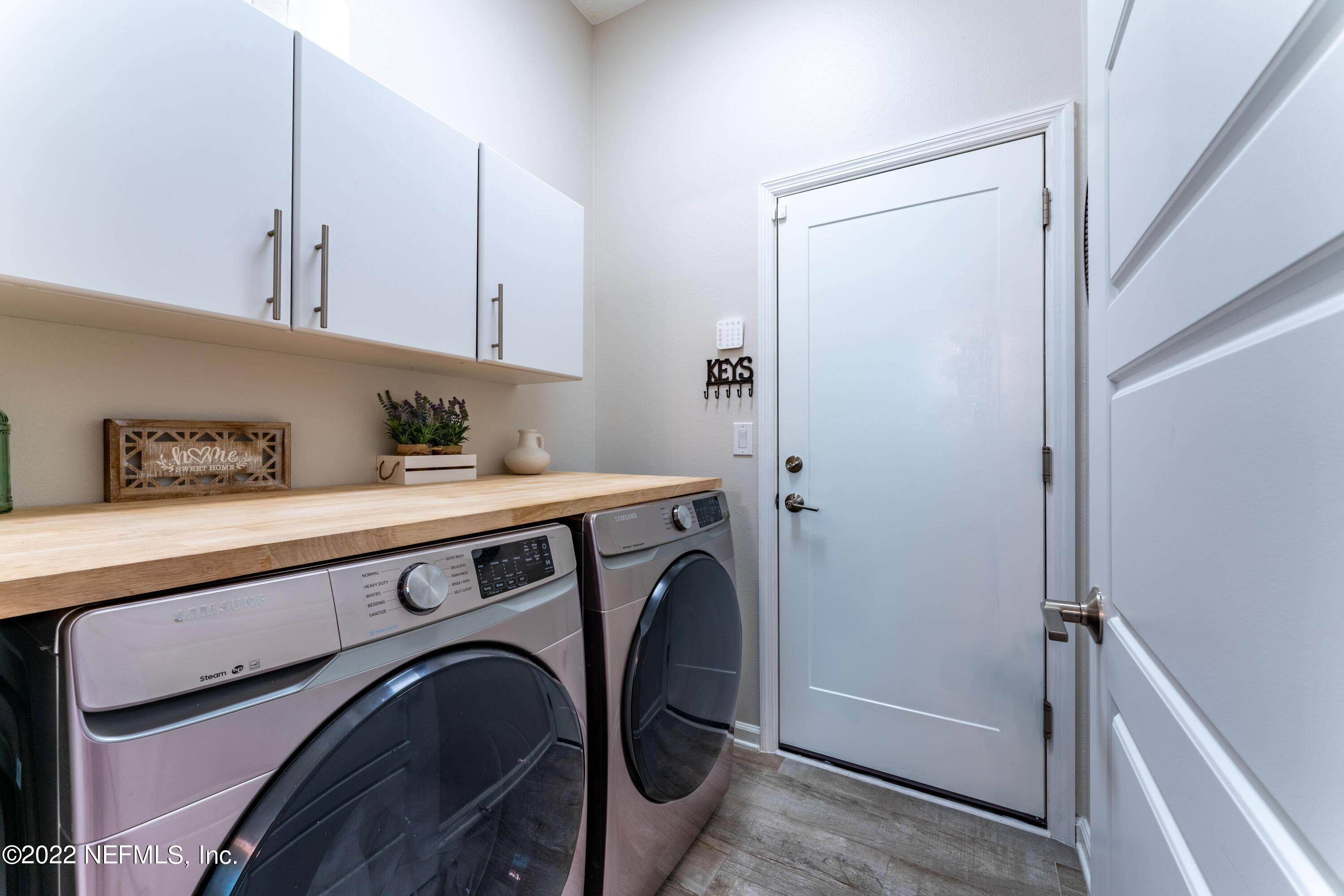 1145 Overdale Road St. Augustine, FL 32080 - Photo 43 of 85 a utility room with dryer and washer