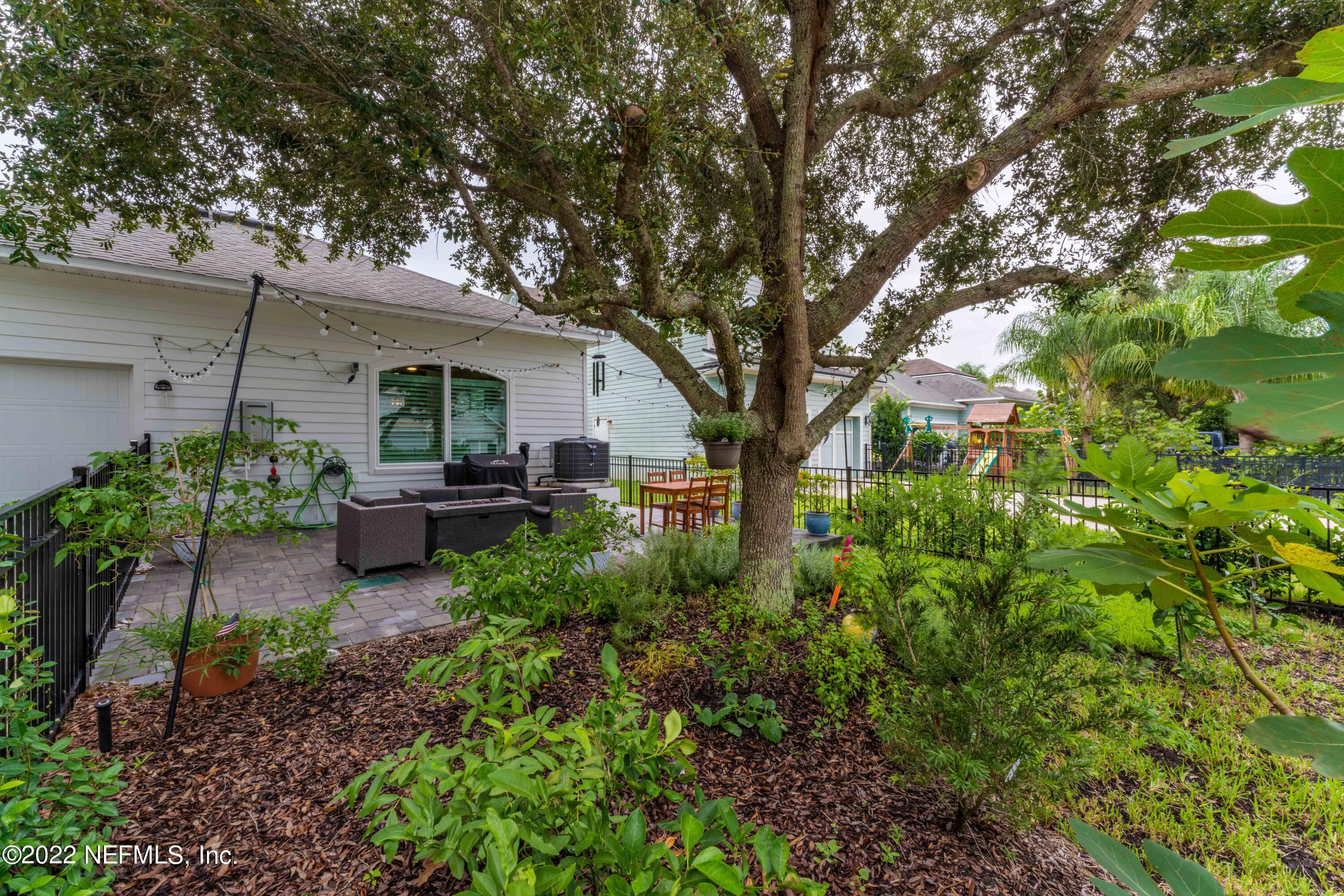 1145 Overdale Road St. Augustine, FL 32080 - Photo 50 of 85 a backyard of a house with seating space