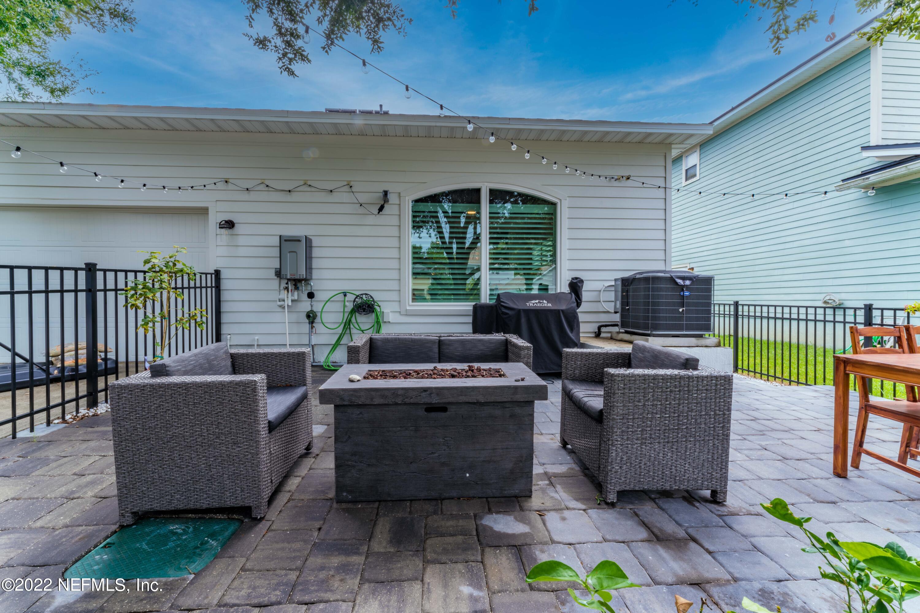 1145 Overdale Road St. Augustine, FL 32080 - Photo 52 of 85 a view of a patio with couches and potted plants
