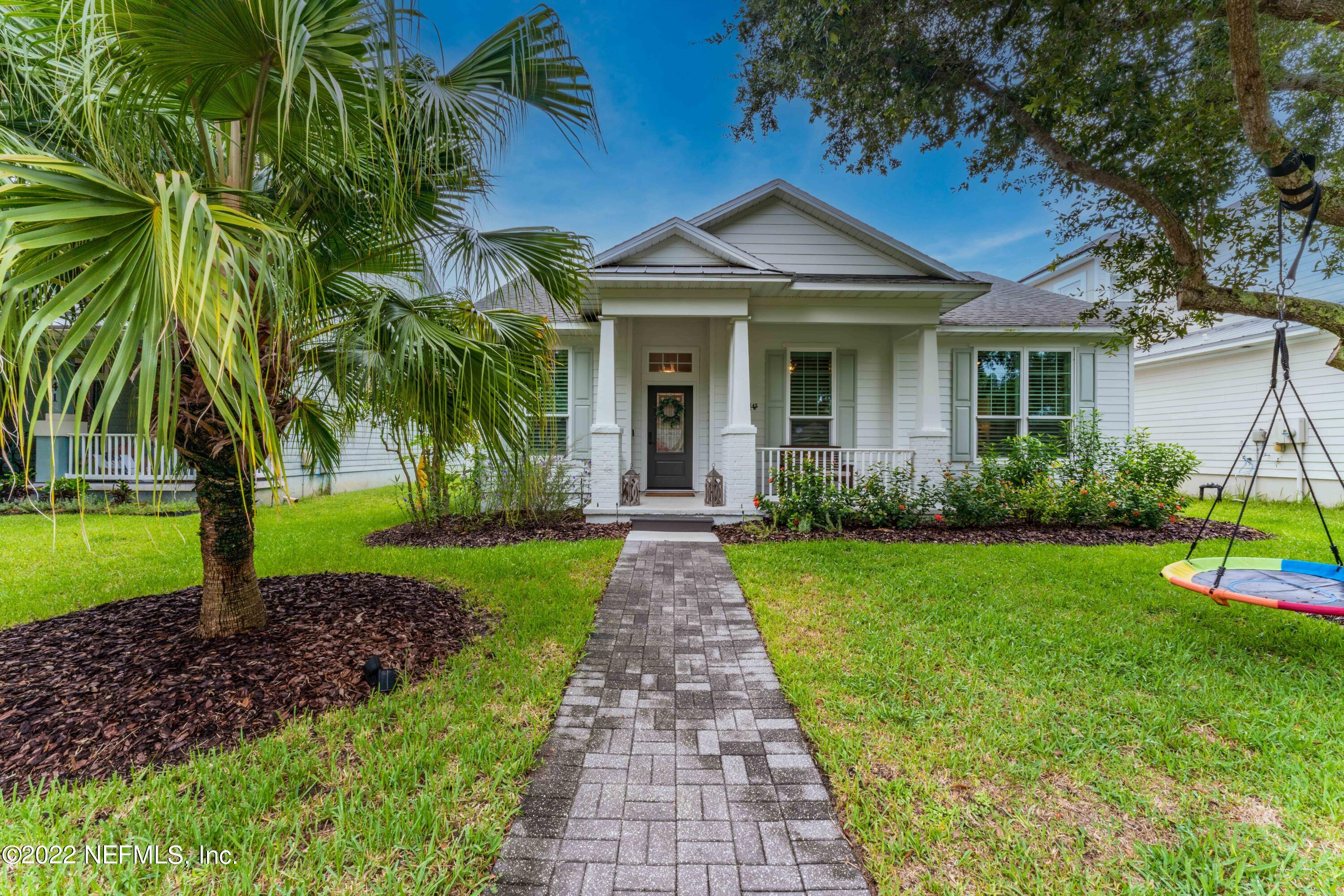 1145 Overdale Road St. Augustine, FL 32080 - Photo 6 of 85 a front view of a house with garden