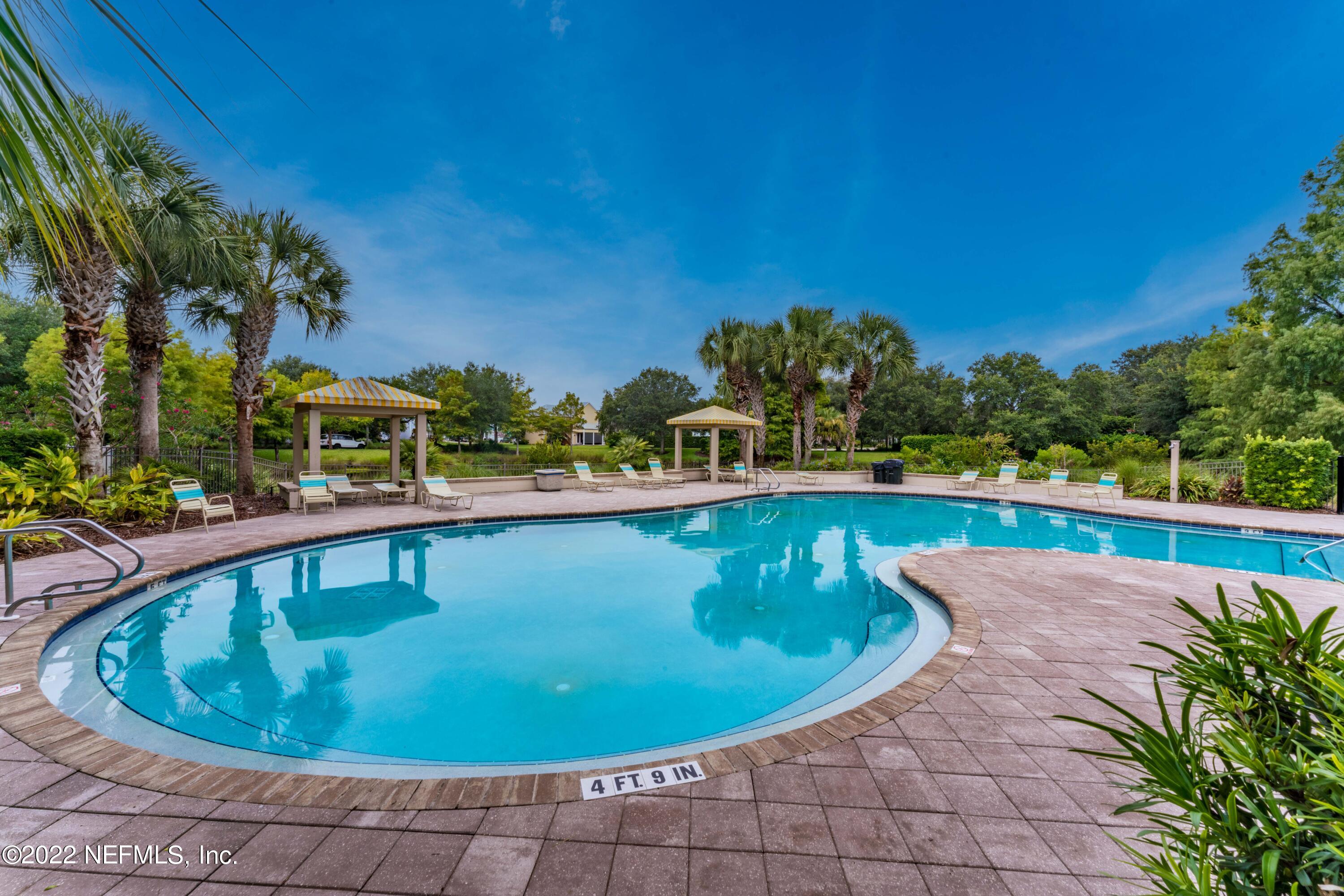 1145 Overdale Road St. Augustine, FL 32080 - Photo 70 of 85 a view of a swimming pool with a yard