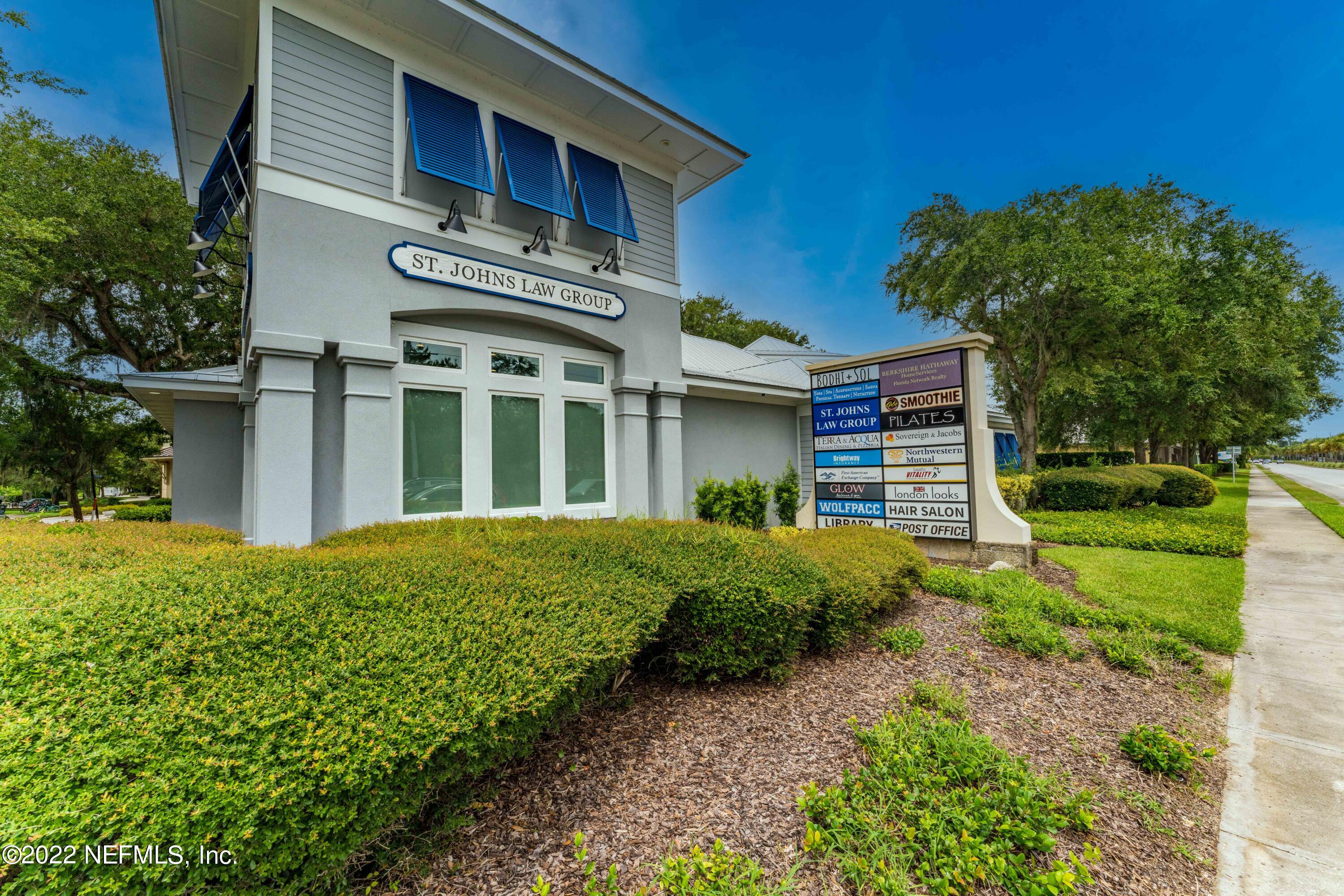 1145 Overdale Road St. Augustine, FL 32080 - Photo 80 of 85 a view of a house with brick walls and a yard with plants
