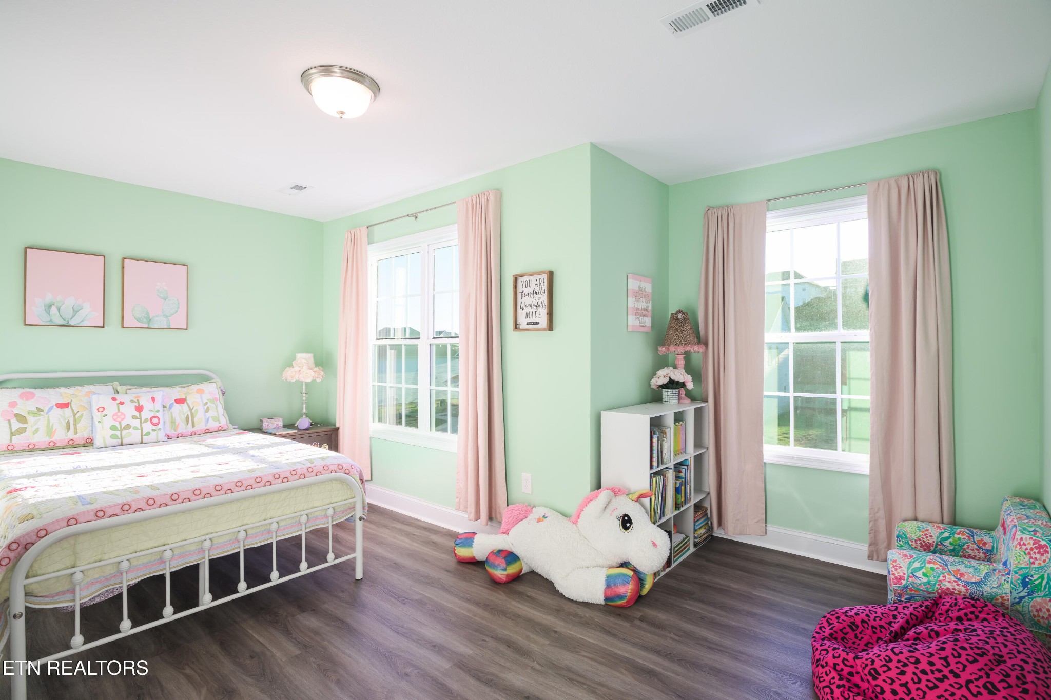 8232 Zodiac Lane Powell, TN 37849 - Photo 13 of 22 a bedroom with a bed and wooden floor