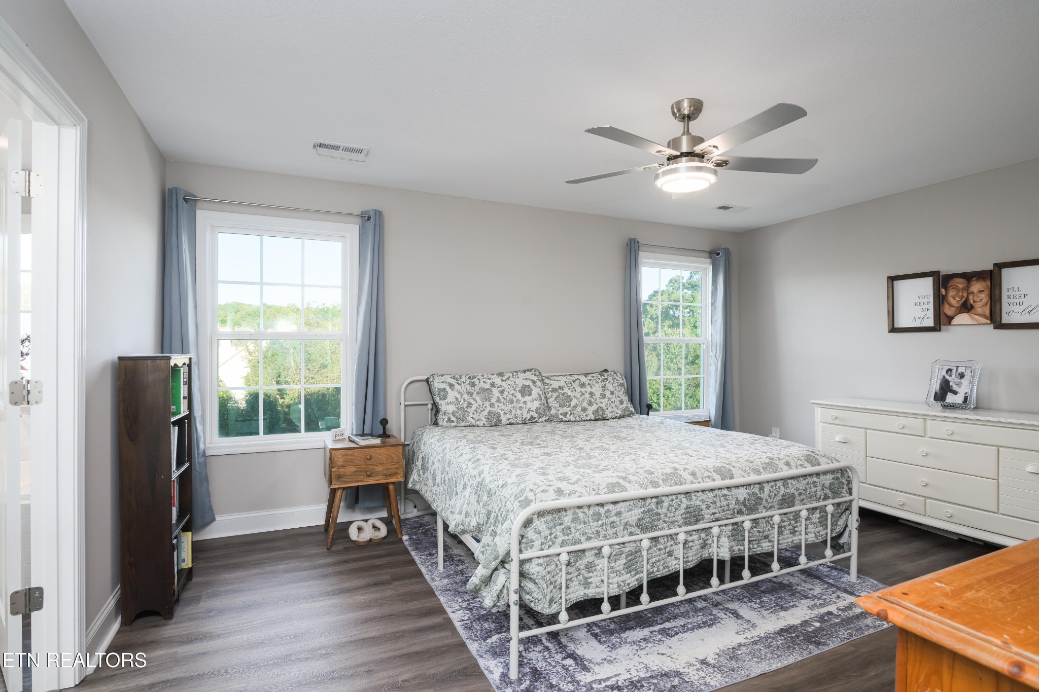 8232 Zodiac Lane Powell, TN 37849 - Photo 16 of 22 a bedroom with a bed and a window