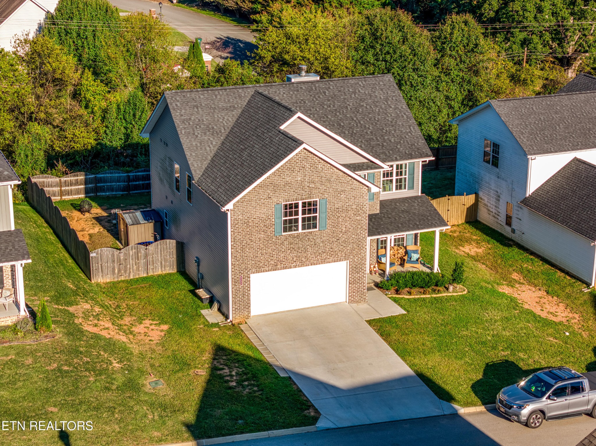 8232 Zodiac Lane Powell, TN 37849 - Photo 22 of 22 a aerial view of a house with swimming pool and sitting area