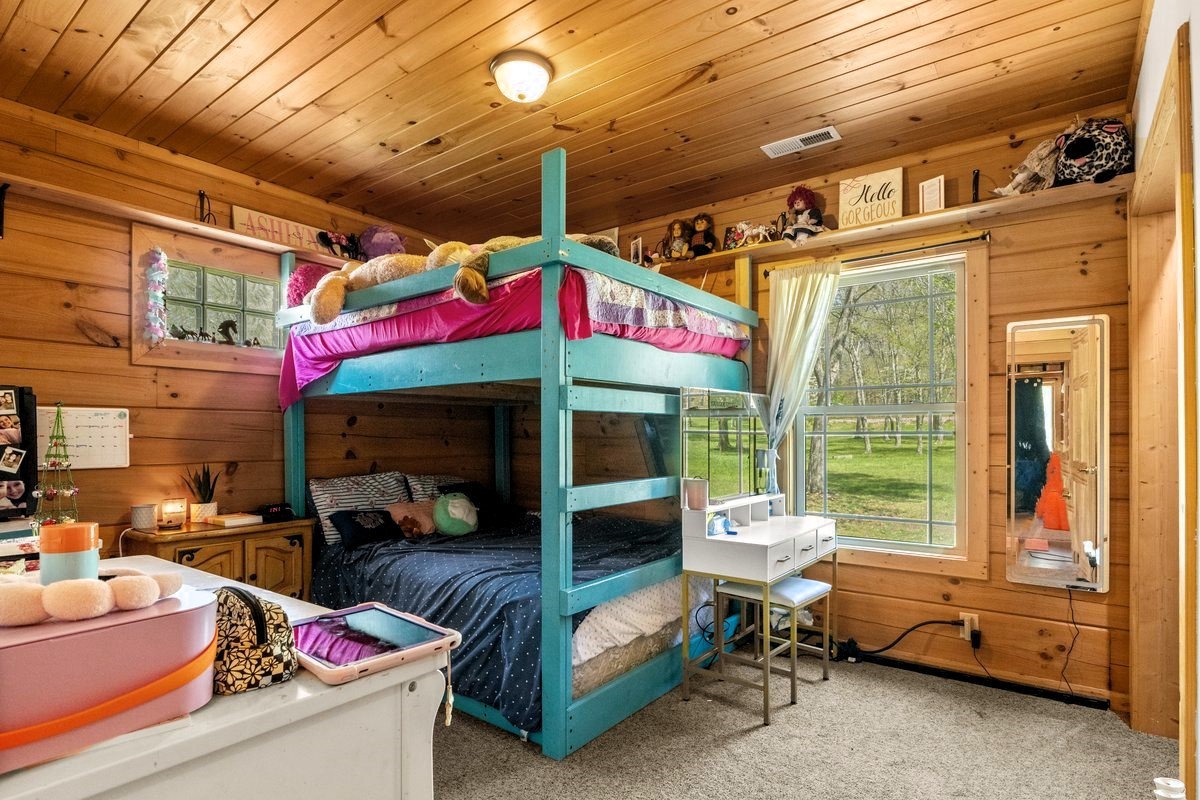 13631 Birdsong Road Holladay, TN 38341 - Photo 37 of 67 a store room with retail shop and outdoor seating