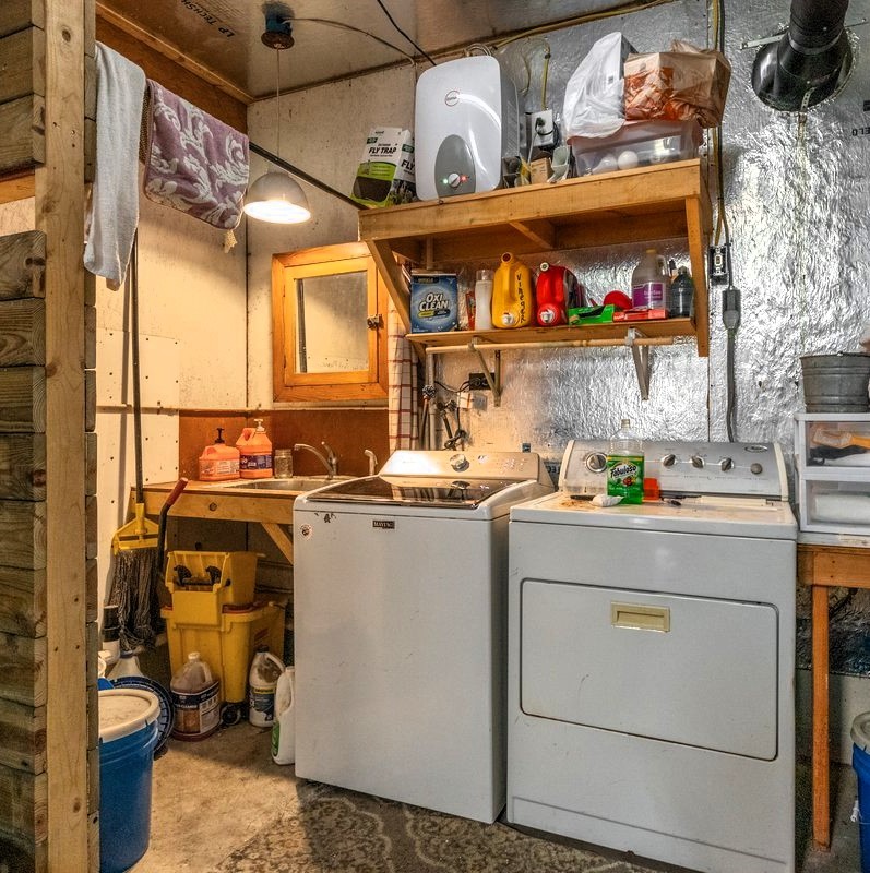 13631 Birdsong Road Holladay, TN 38341 - Photo 44 of 67 a room with storage and utility