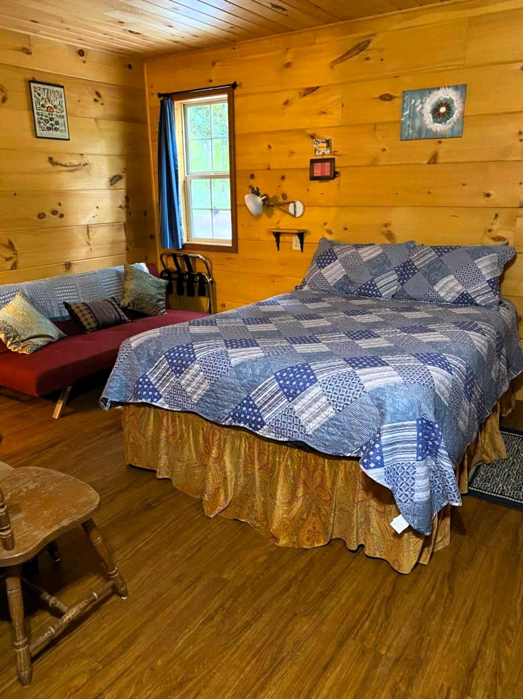 13631 Birdsong Road Holladay, TN 38341 - Photo 57 of 67 a bed sitting in a bedroom next to a window