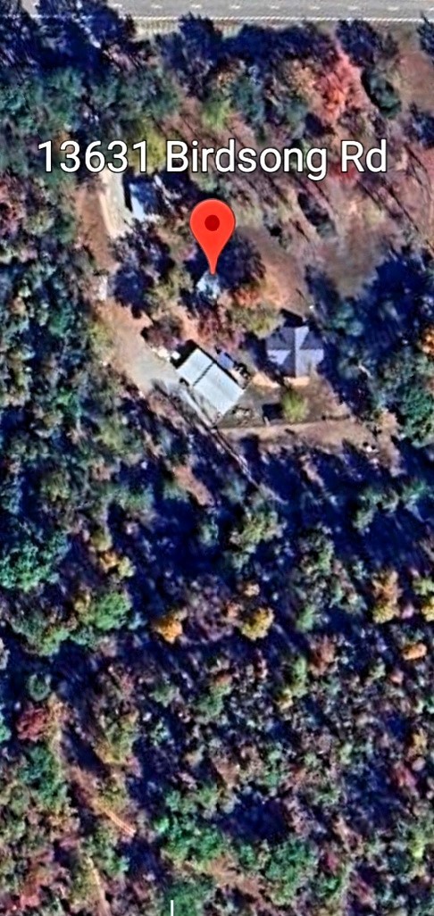 13631 Birdsong Road Holladay, TN 38341 - Photo 66 of 67 an aerial view of residential houses with outdoor space