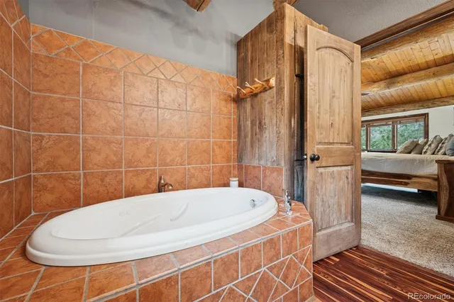 a bathroom with a white tub