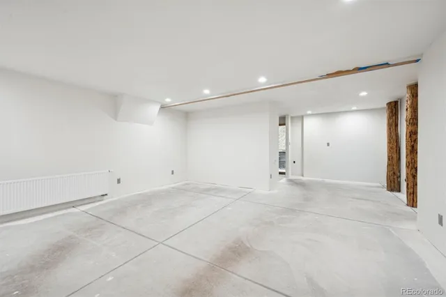 a view of a chair and table in the balcony