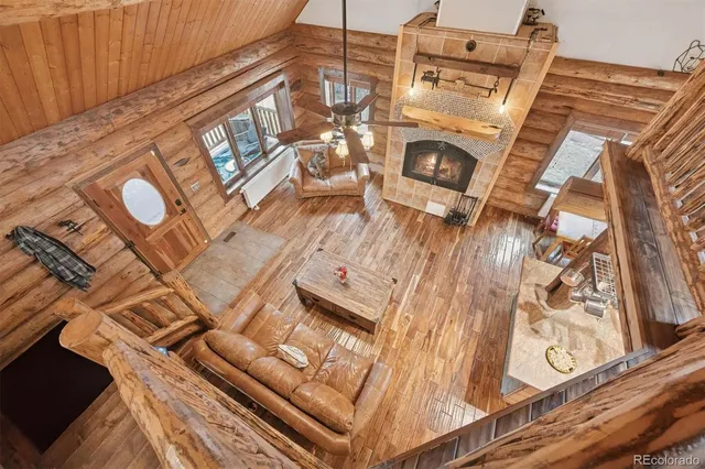 a view of a fireplace with wooden floor