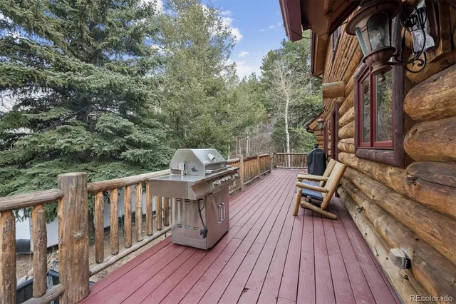 a view of a mountain with a backyard of the house