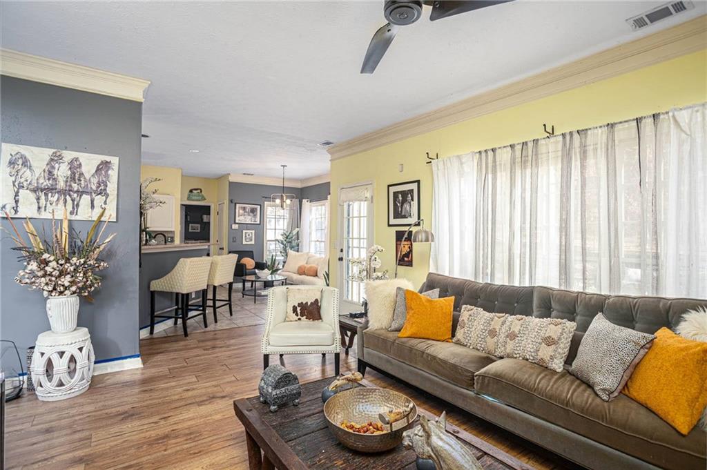 655 Scenic View Stone Mountain, GA 30087 - Photo 13 of 41 a living room with furniture and wooden floor
