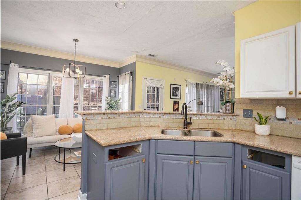 655 Scenic View Stone Mountain, GA 30087 - Photo 17 of 41 a bathroom with a sink and large mirror