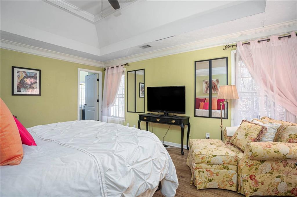 655 Scenic View Stone Mountain, GA 30087 - Photo 25 of 41 a bedroom with bed and a flat screen tv