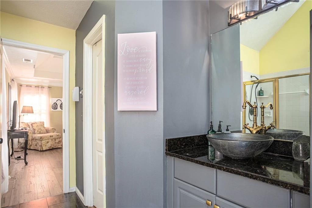 655 Scenic View Stone Mountain, GA 30087 - Photo 30 of 41 a kitchen with a sink and a refrigerator