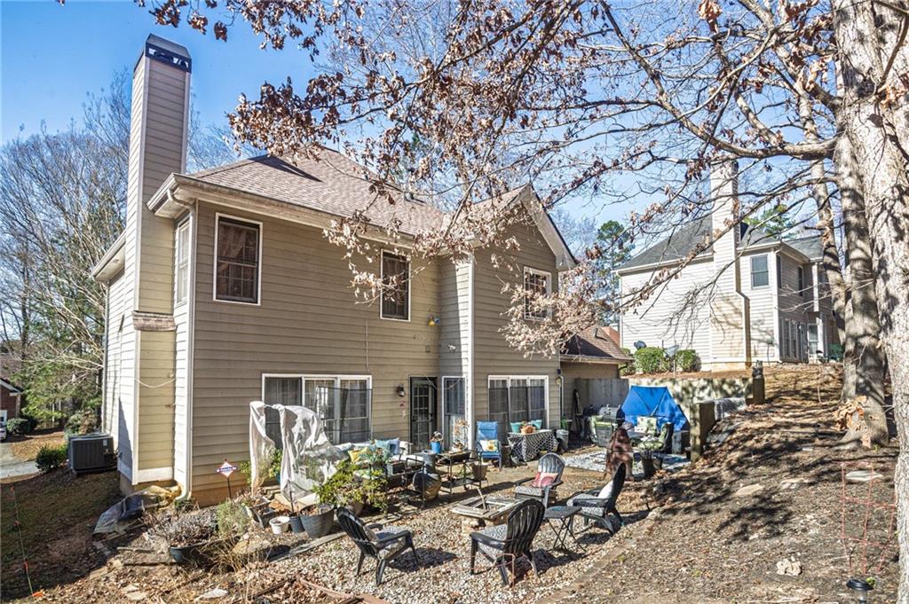 655 Scenic View Stone Mountain, GA 30087 - Photo 39 of 41 a front view of a house with garden