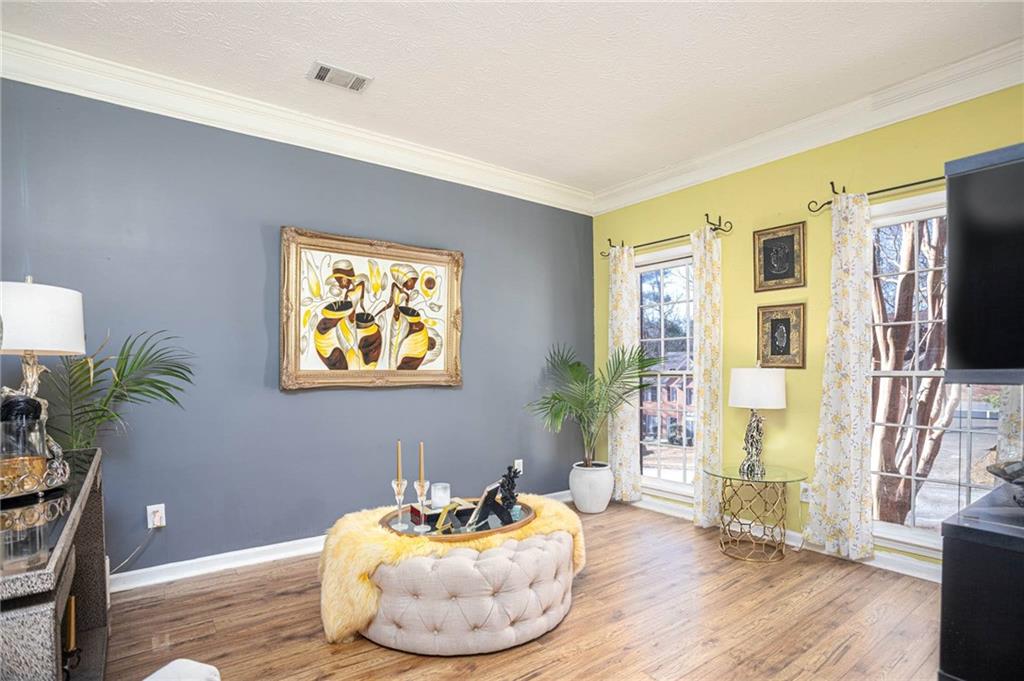 655 Scenic View Stone Mountain, GA 30087 - Photo 4 of 41 a living room with furniture and a potted plant
