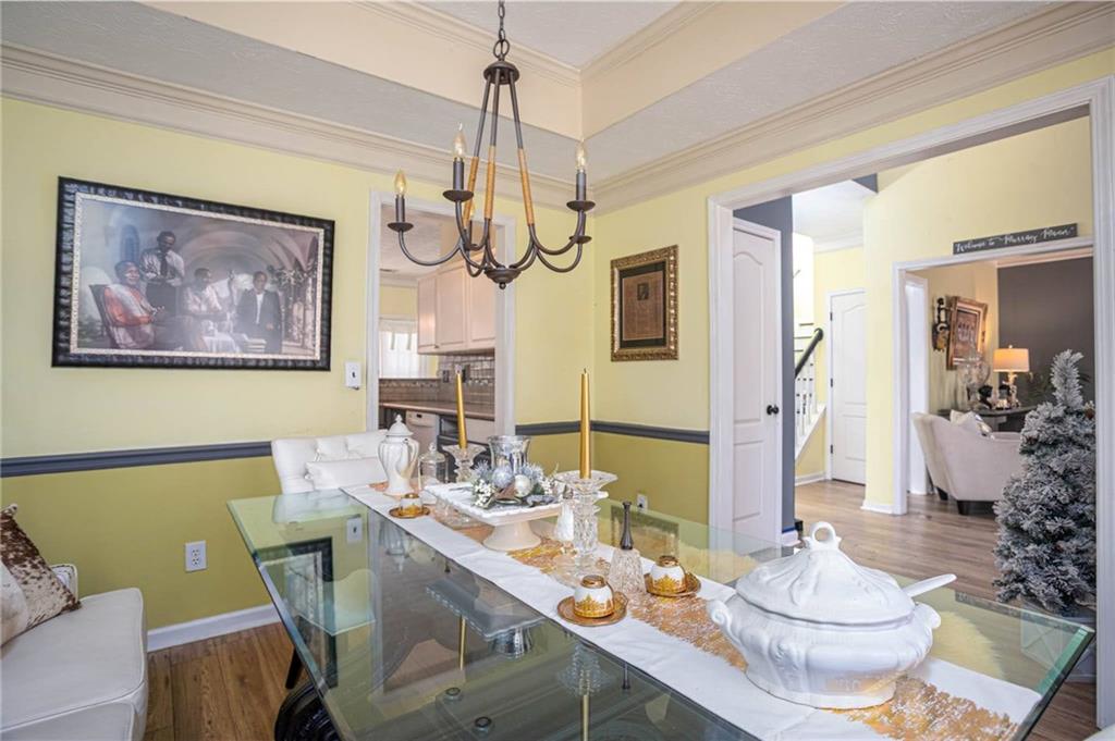 655 Scenic View Stone Mountain, GA 30087 - Photo 9 of 41 a dining room with furniture and window