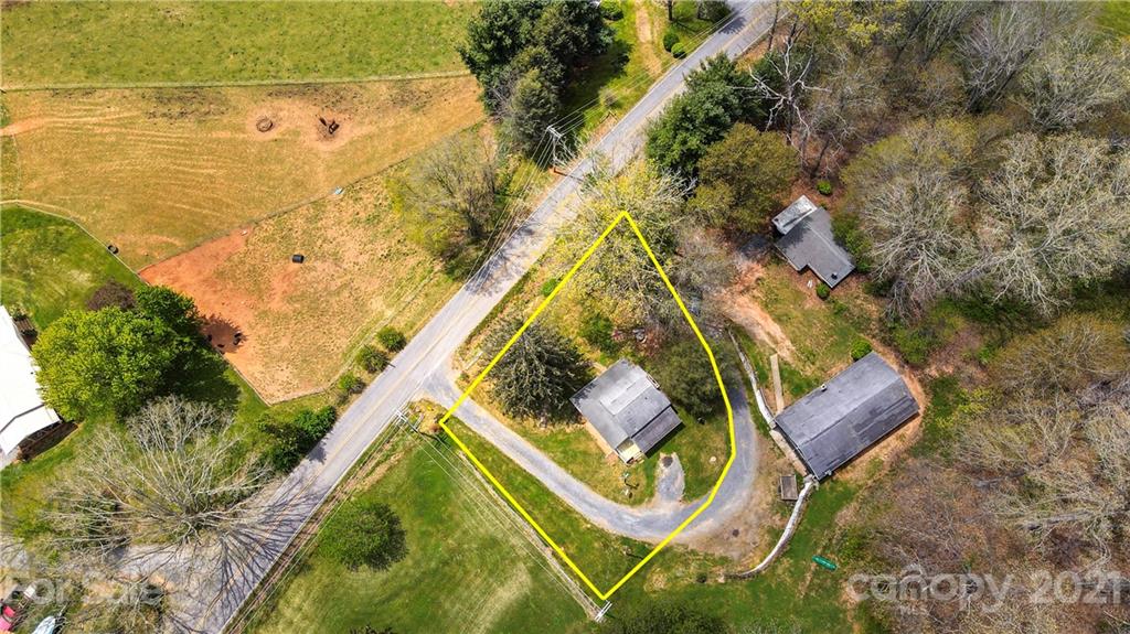 4900 Crabtree Mountain Road Clyde, NC 28721 - Photo 27 of 33 an aerial view of a swimming pool and outdoor space