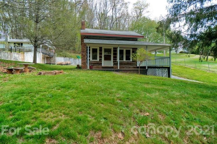 4900 Crabtree Mountain Road Clyde, NC 28721 - Photo 5 of 33 a view of house with a backyard