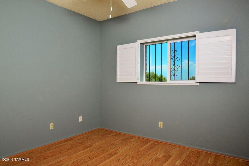 8001 East Presidio Road Tucson, AZ 85750 - Photo 19 of 25 an empty room with windows