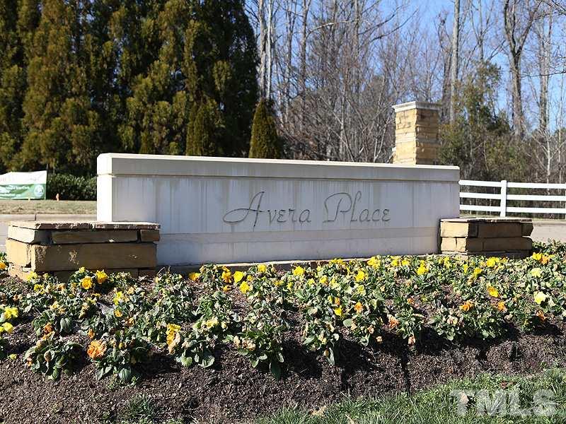 11370 Involute Place, Unit 105 Raleigh, NC 27617 - Photo 2 of 15 a view of a sign board with buildings